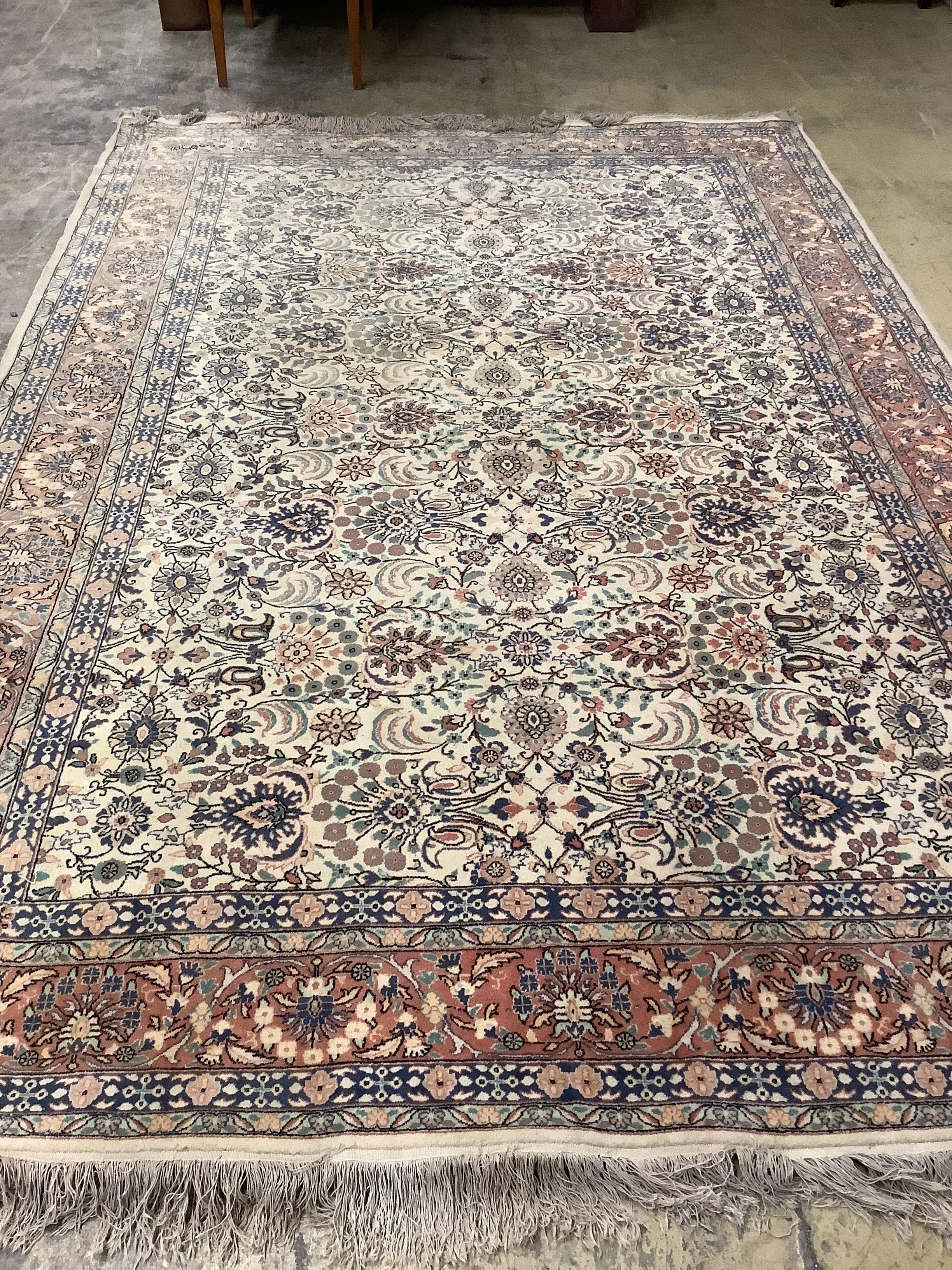 A North West Persian style ivory ground carpet, 300 x 195cm